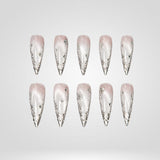 Icy Silver frosted silver cat eye press-on nails in a stiletto shape - glitter, chrome design
