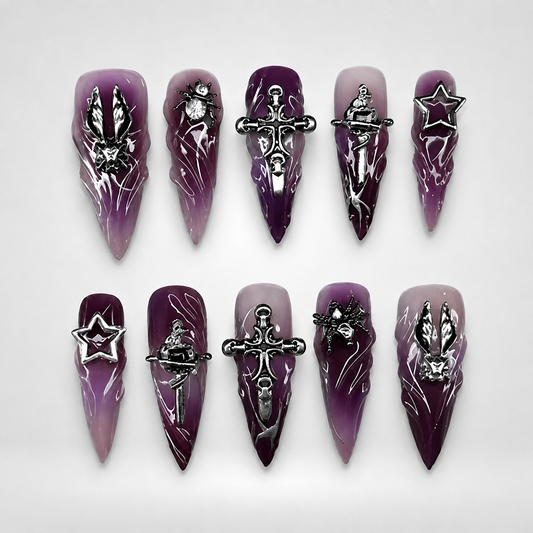 Velvet Hex gothic press-on nails — purple gradients with silver ornamental studs on stiletto tips