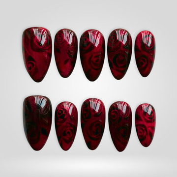 Rose Shadow press-on nails, hand-painted floral design on cat-eye shaped nails