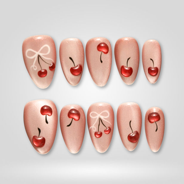 Cherry Kiss press-on nails — nude pink with cherry design