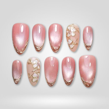 Petal Glow Pink Shimmer Floral press-on nails: pink shimmer, delicate flowers and gold-edged accents
