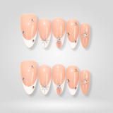 Crystal Shine French tip press-on nails with silver rhinestones