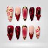 Red Kiss press-on nails — leopard and lip print design