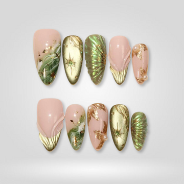 Dreamy Glow hand-painted press-on nails with sparkling Y2K designs on almond shape