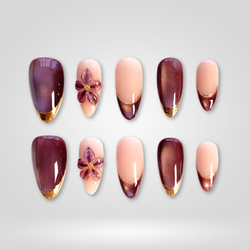 Plum Bloom press-on nails — marble design with gold details