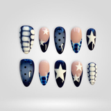Navy Star press-on nails — hand-painted stars and minimal design on almond nails