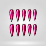Metallic Siren chrome spike cat eye press-on nails in a stiletto shape - chrome, studded design