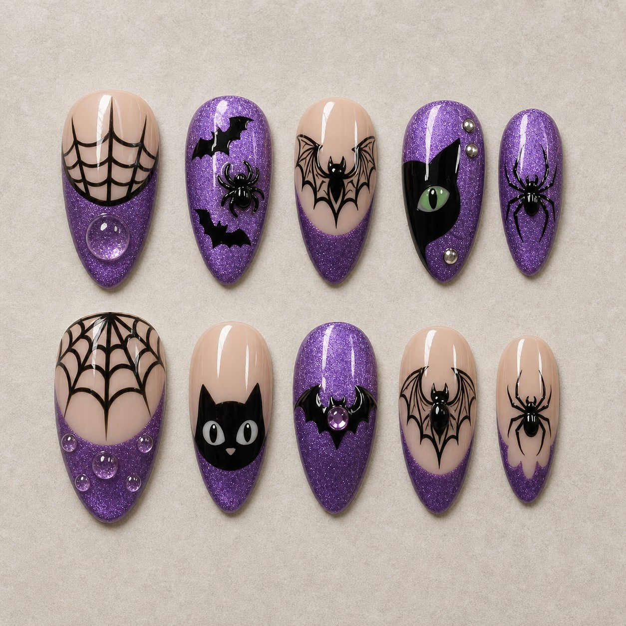 Full set of 10 almond press-on nails — Amethyst Web Halloween nail art with spider web, cat eye, bat
