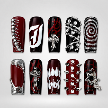 Crimson Riot press-on nails — burgundy and black mixed gothic designs on square