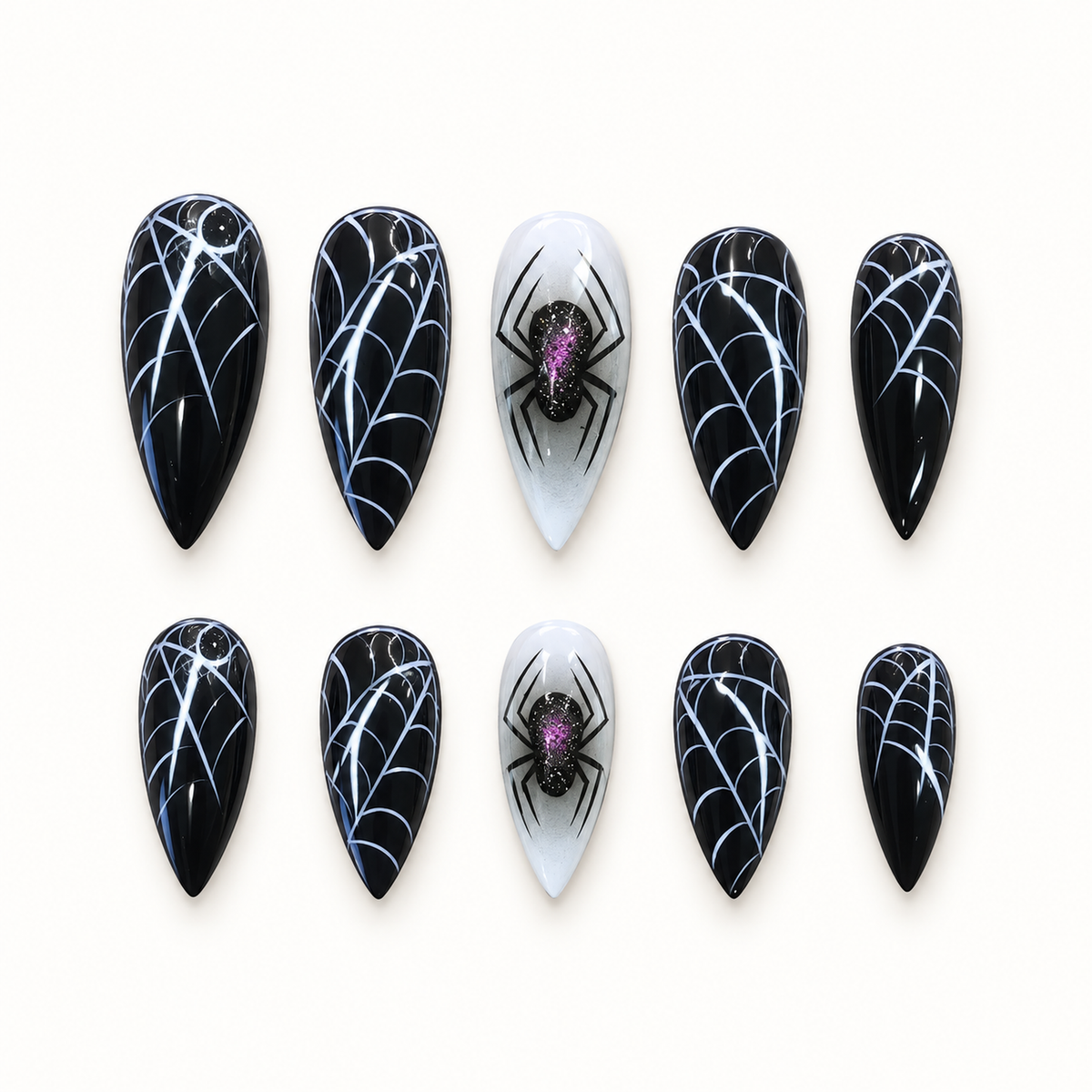 Midnight Widow Web press-on nail set with black web linework and gray spider accents on a neutral background.