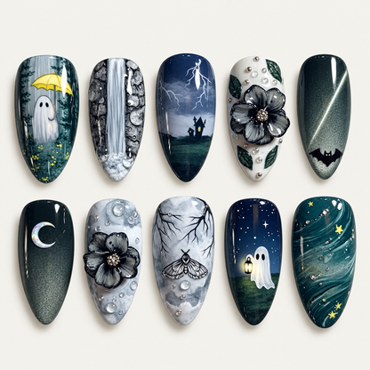 Midnight Haunt press-on nail set displayed against a light greige background, featuring ghost, moon, bat, floral, and dark celestial artwork.