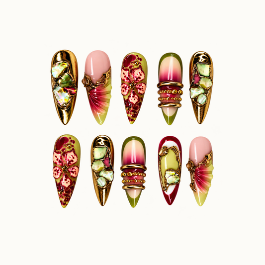 Ten coordinated nails in two rows with pink floral motifs, olive gradients, iridescent mosaics, and raised gold-tone accents on a light neutral background.