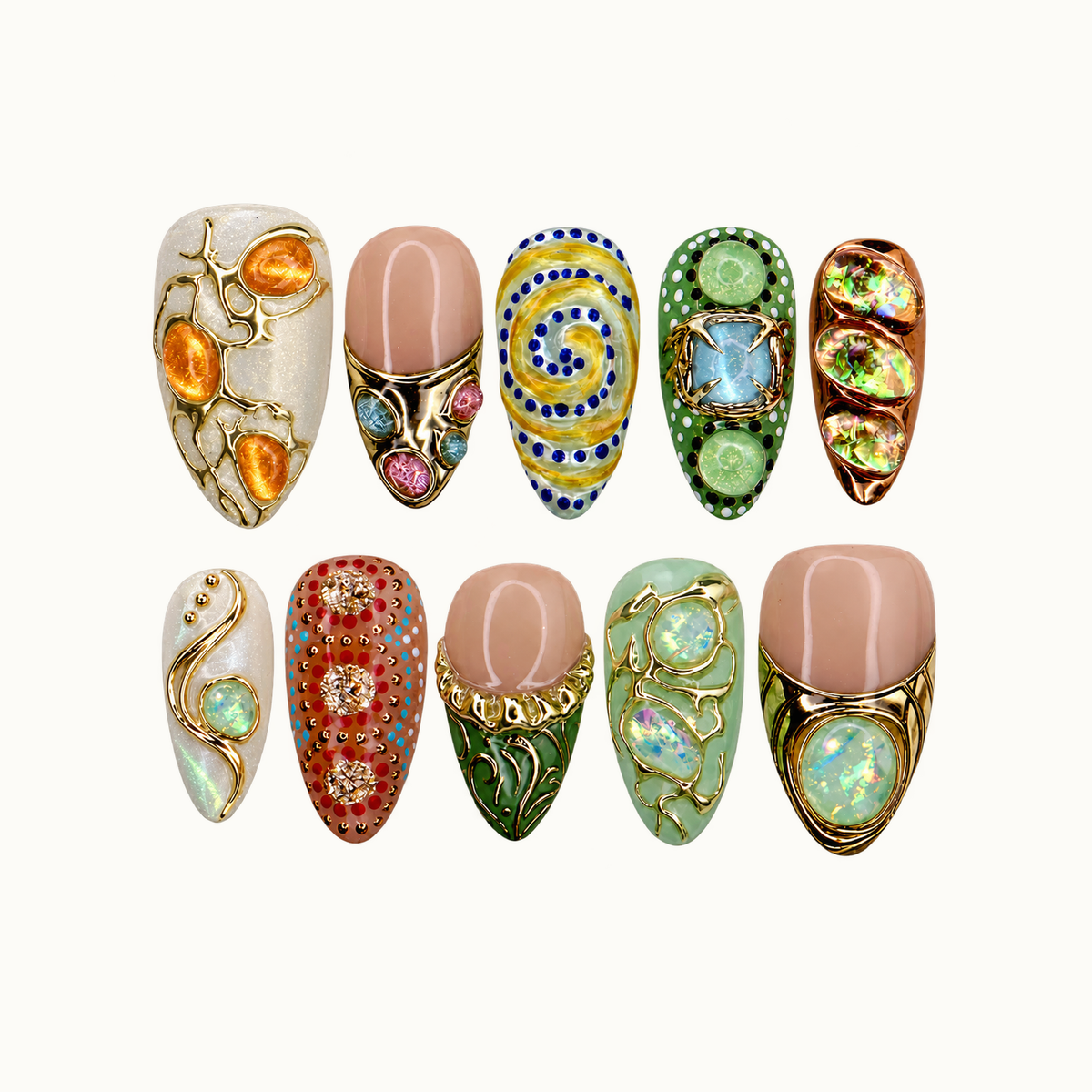 Ten decorated nails arranged in two rows on a light neutral background, featuring gold-tone framing, colorful dots, a yellow spiral, and opalescent-looking accents.