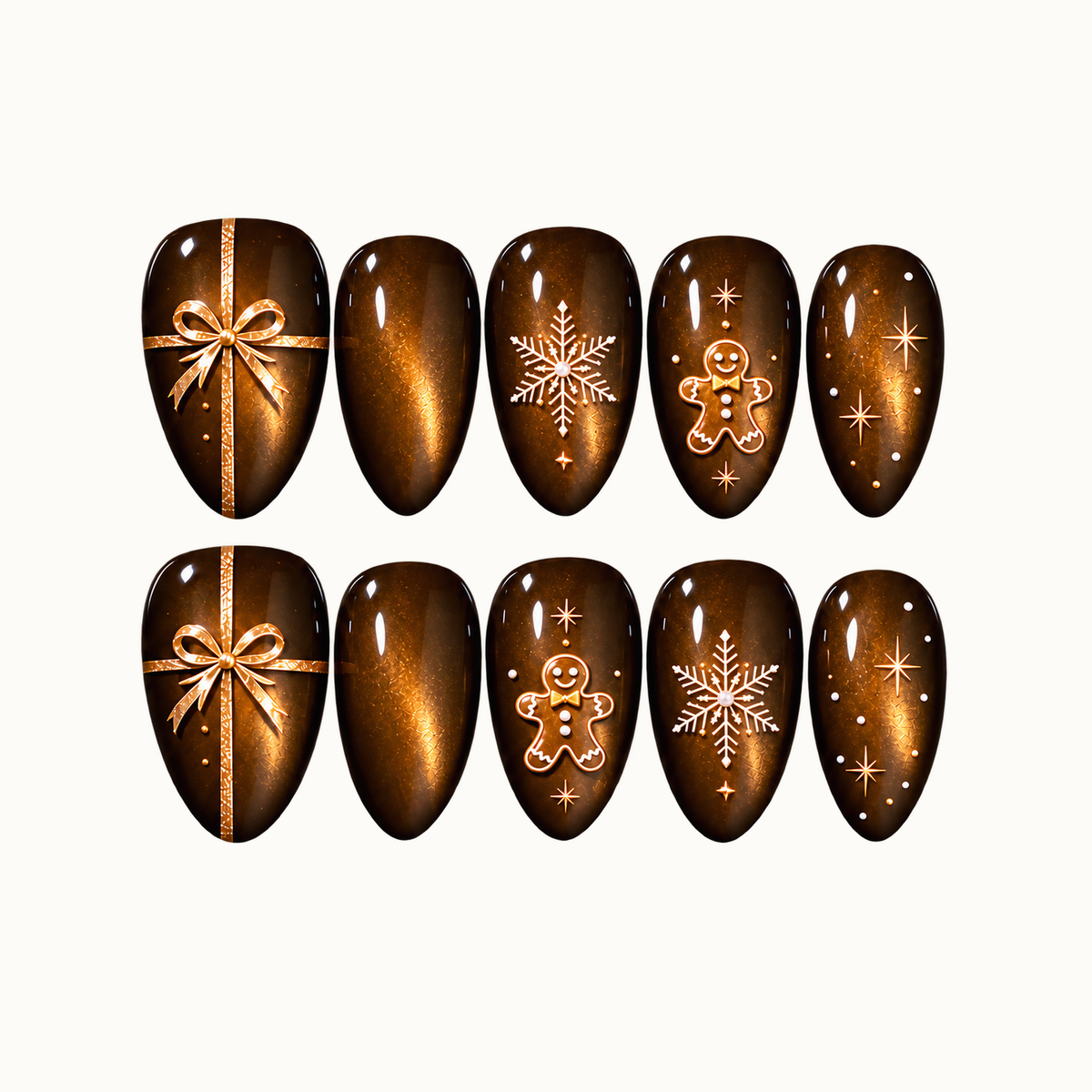 Ten glossy brown and amber shimmer nails in two rows, featuring gold-toned gift bows, white snowflakes, gingerbread figures, and stars on a light neutral background.