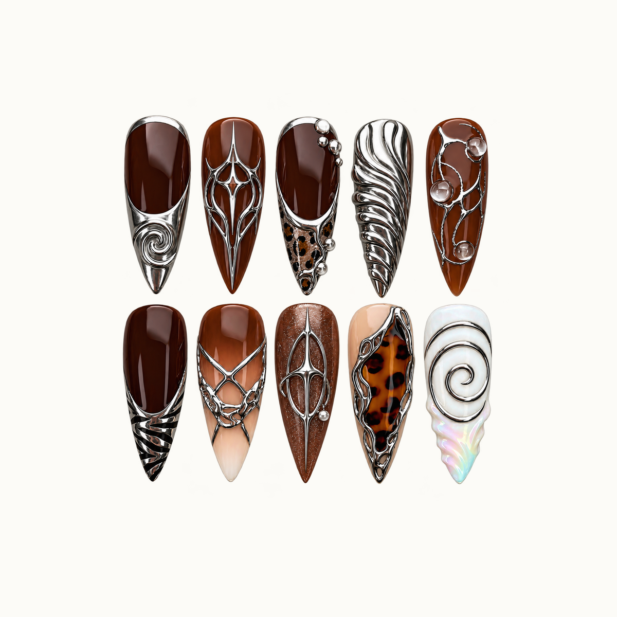 Ten pointed nails arranged in two rows on a pale background, featuring cocoa brown, silver-toned spirals and stars, tortoiseshell-style accents, and pearly white.