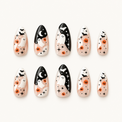 Moonlit Ghost Parade press-on nail set with ivory, black, white, and orange ghost, pumpkin, bat, moon, and star artwork.