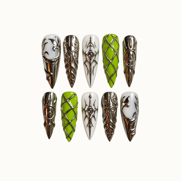 Ten pointed nails arranged in two rows on a pale neutral background, featuring lime green latticework, milky white accents, and ornate reflective silver-tone details.