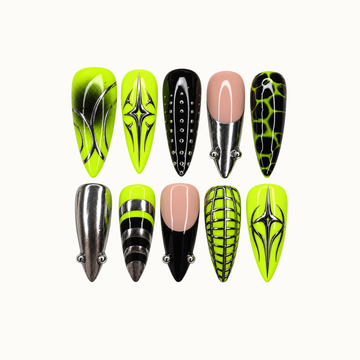 Ten coordinated nails arranged in two rows on a light background, featuring neon lime, black, nude pink, silver starbursts, studs, stripes, and a grid.