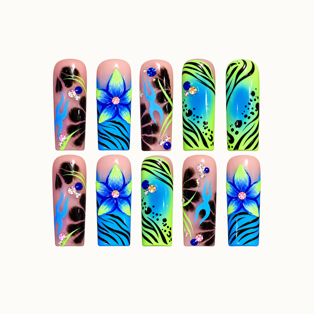 Ten glossy nails arranged in two rows on a light background, featuring blue-and-lime flowers, blue flames, black patterns, and rhinestone accents.