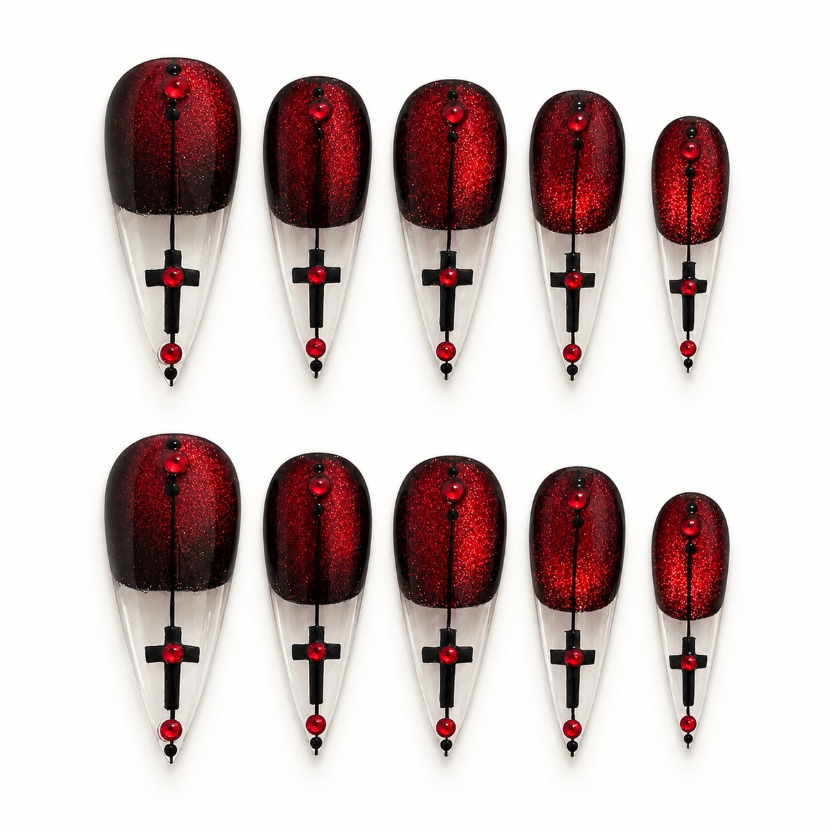 Crimson red glitter press-on nail set with black edging, clear pointed tips, black cross-inspired details, and red gem-like accents.