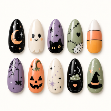 Ten pastel Halloween press-on nails in a clear case, featuring a ghost, crescent moon, black cat, stitched nail, spider web, pumpkin, cauldron, and pointed hat.