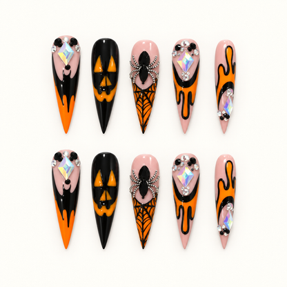Ember Web Press-On Nails arranged to show black, orange, and blush pink web-inspired artwork.