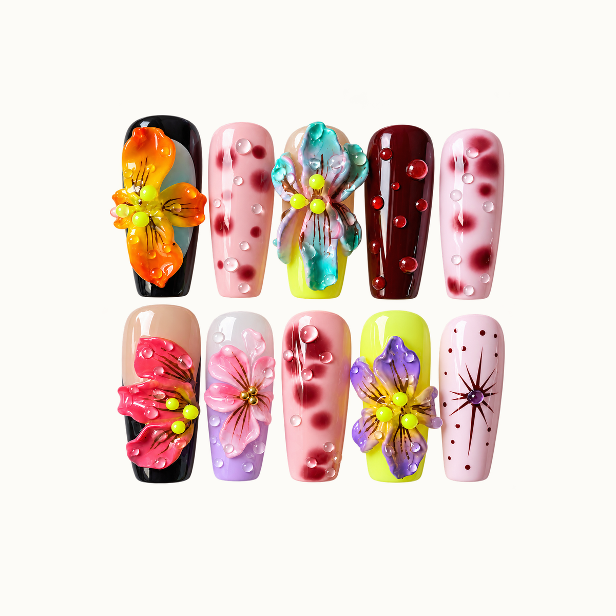 Ten glossy nails in two rows on a light background, featuring raised multicolor flowers, pink-and-burgundy spots, droplets, and a starburst accent.