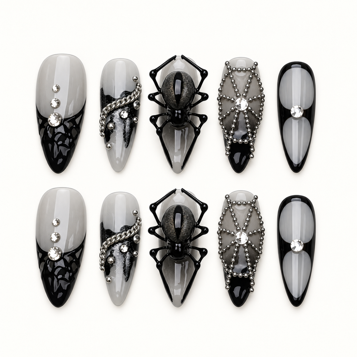 Midnight Web press-on nails in smoky gray and glossy black with dimensional spider, web, bead-chain, and crystal-inspired accents.