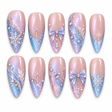 Ten blush pink, icy blue, and lavender nails arranged in two rows on a light background, with snowflakes, iridescent bows, silver-colored curves, and gem accents.