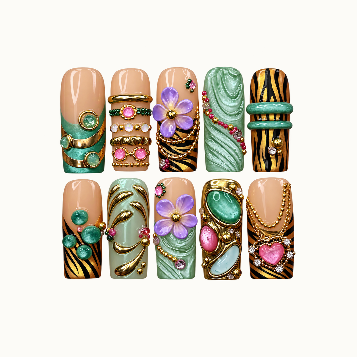 Ten coordinated nails arranged in two rows on a light background, featuring green swirls, lavender flowers, black-and-gold stripes, and jewelry-inspired accents.