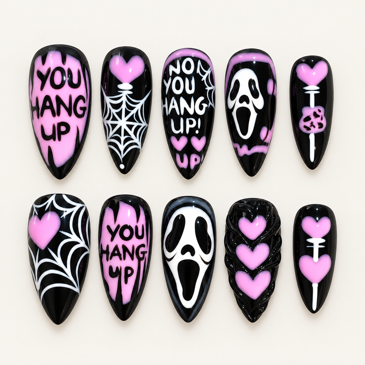 Pink Midnight Web nail set with black, bright pink, and white spiderweb, heart, lettering, and eerie graphic designs.