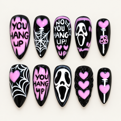 Pink Midnight Web nail set with black, bright pink, and white spiderweb, heart, lettering, and eerie graphic designs.
