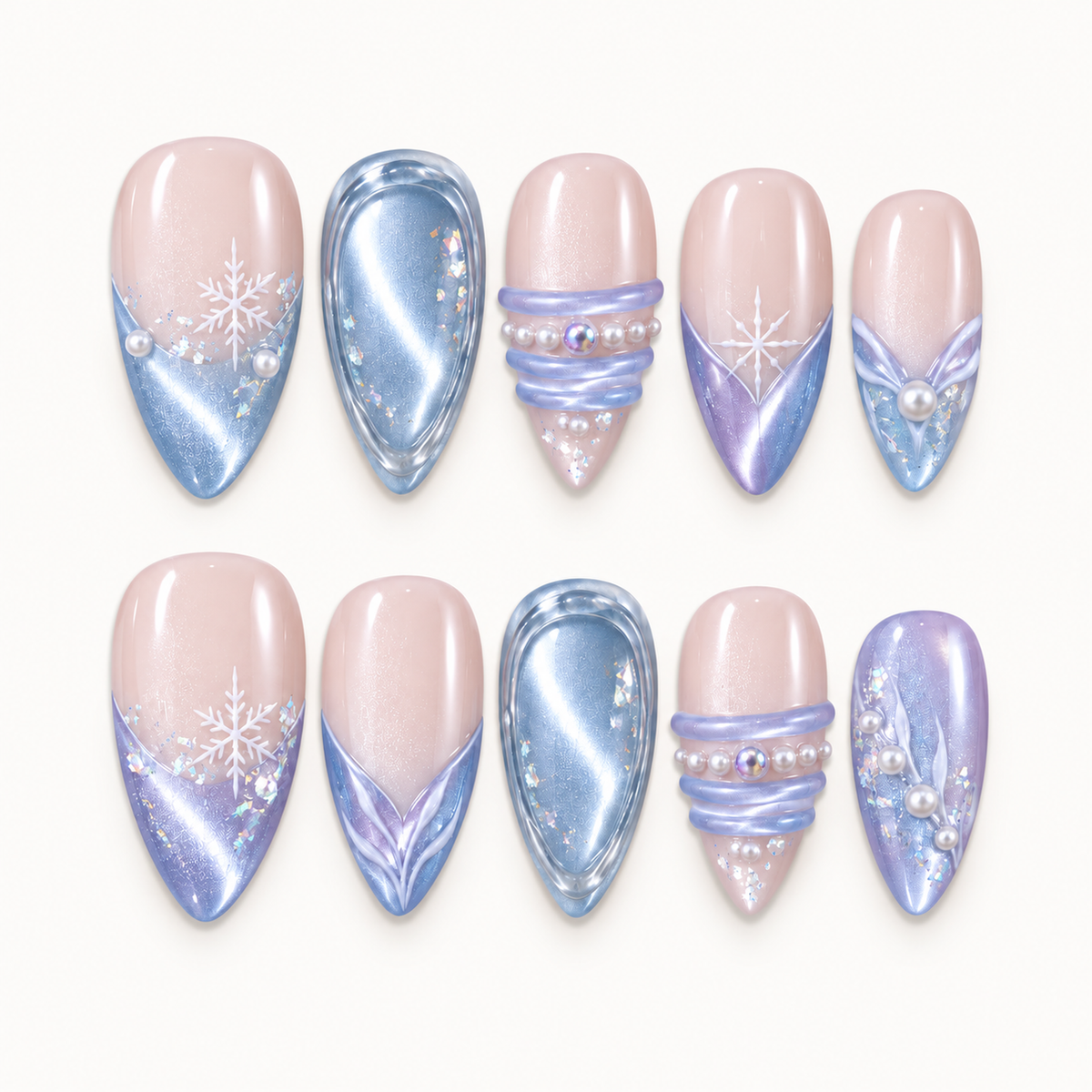 Ten nails arranged in two rows on a light neutral background, showing blush-pink bases, blue and lilac shimmer, snowflakes, and pearl-like accents.