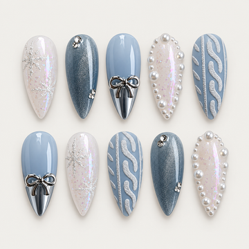 Ten Frosted Blue Bow nail designs arranged in two rows on a light background, showing blue shimmer, bows, pearl-like borders, starbursts, and raised knit-inspired lines.