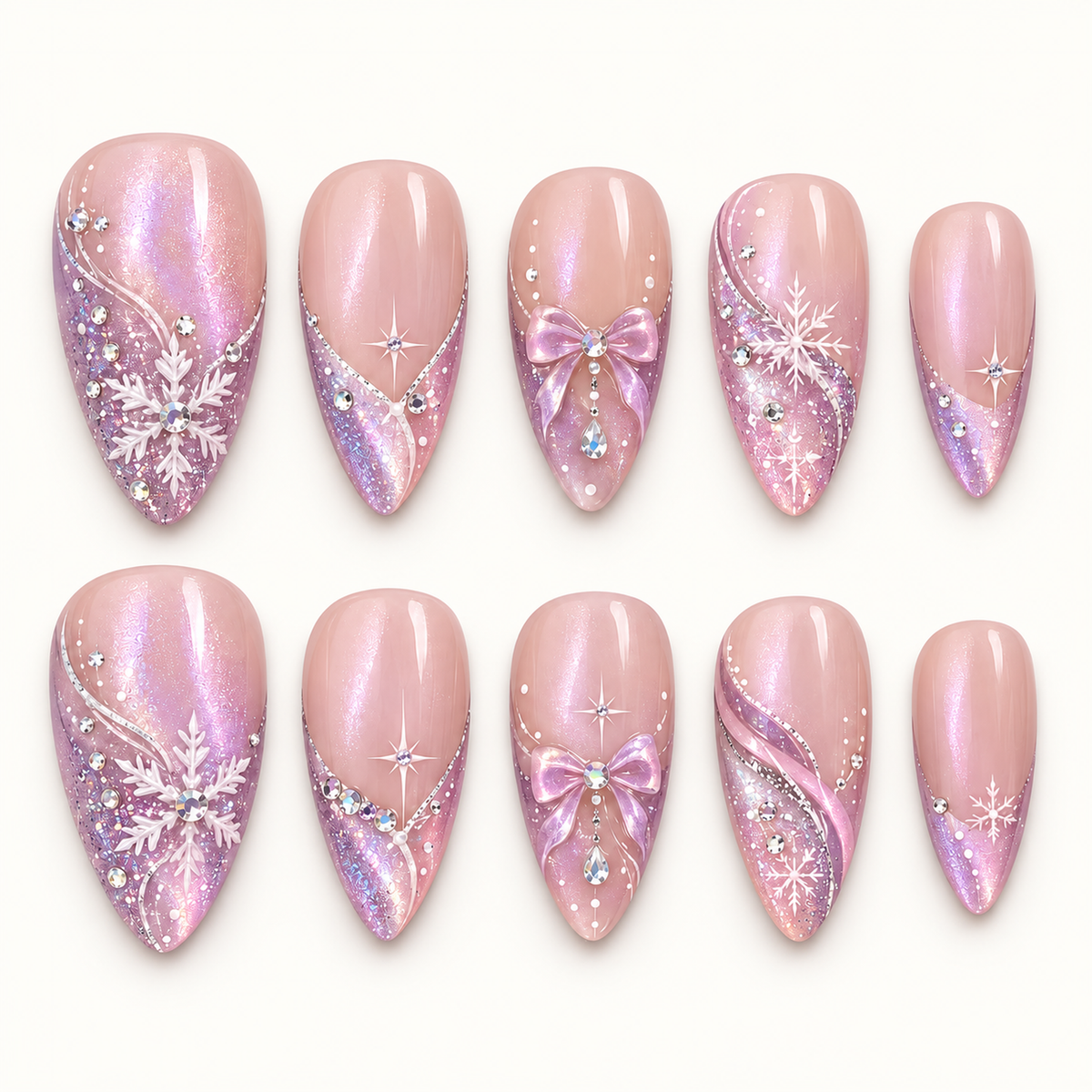 Ten blush pink nails arranged in two rows on a light neutral background, with lavender glitter tips, white snowflakes, pink bows, and gem accents.