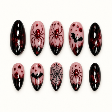 Crimson Web press-on nail set with glossy black tips, burgundy splatter, spiders, bats, and web nail art.