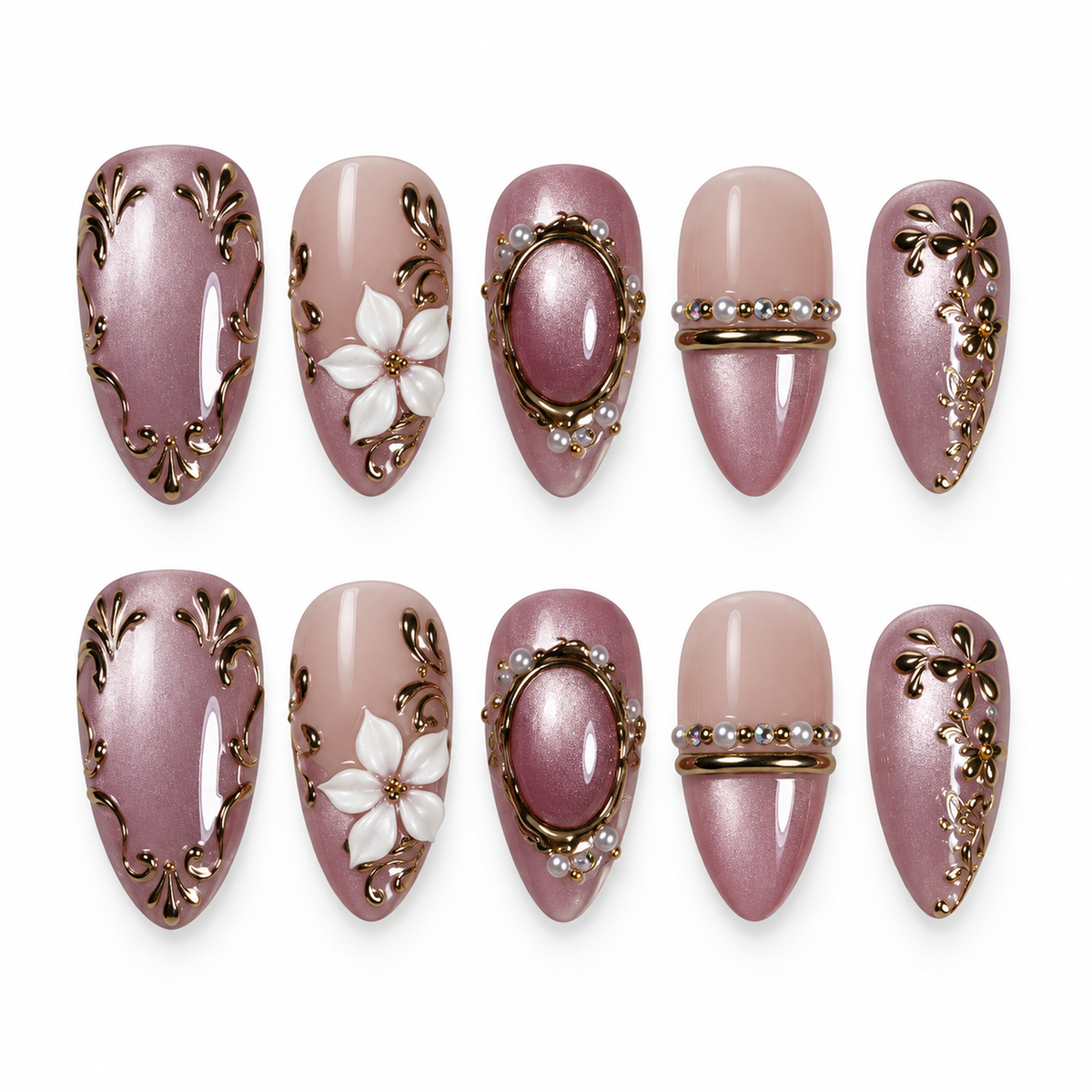 Ten mauve and blush nude nails arranged in two rows on a light background, featuring gold-toned scrollwork, white flowers, and oval framed accents.