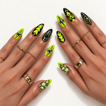Hand model mockup showing the neon green and black design with orbital accents, heart-like graphics, and silver-toned pointed details, styled with gold-toned rings.