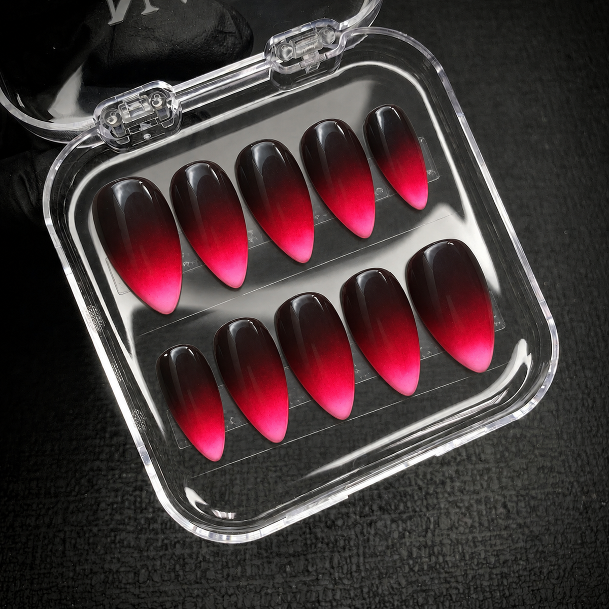 Open Nail Handy package presenting the Midnight Fuchsia Fade press-on nail set.