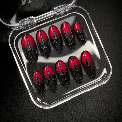 Open Nail Handy branded package displaying the Crimson Gate press-on nail set and included presentation materials.