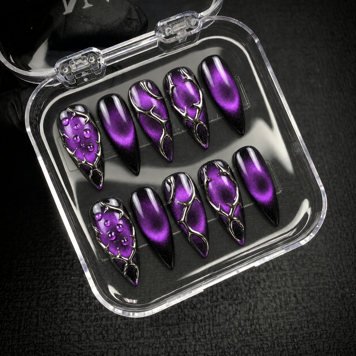 Open Nail Handy package box presenting the Violet Thorn Veil press-on nail set.