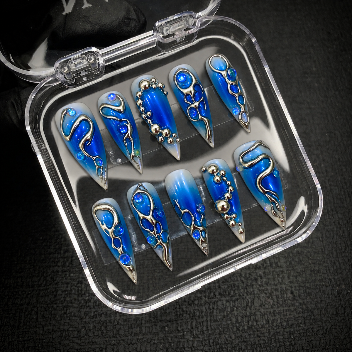 Open Nail Handy package presentation for the Aurora Chrome Tide press-on nail set.