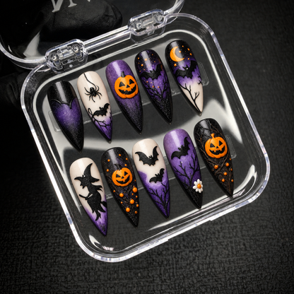 Midnight Pumpkin Spell press-on nail set presented in an open Nail Handy package box.