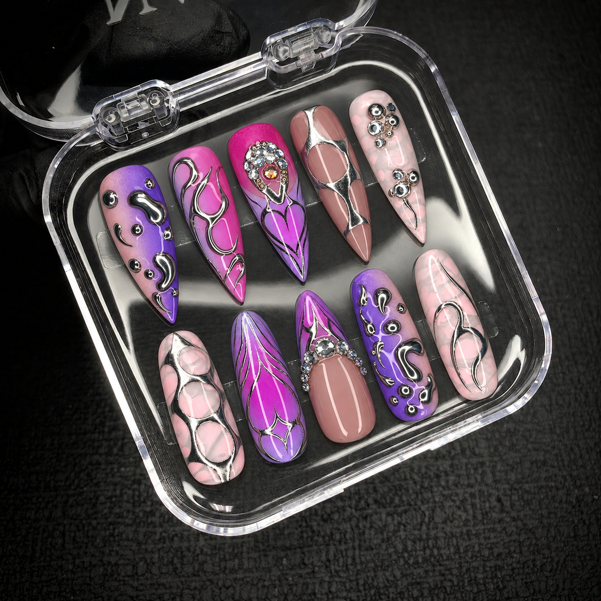 Open Nail Handy package box with Chrome Orchid Static press-on nails presented inside.