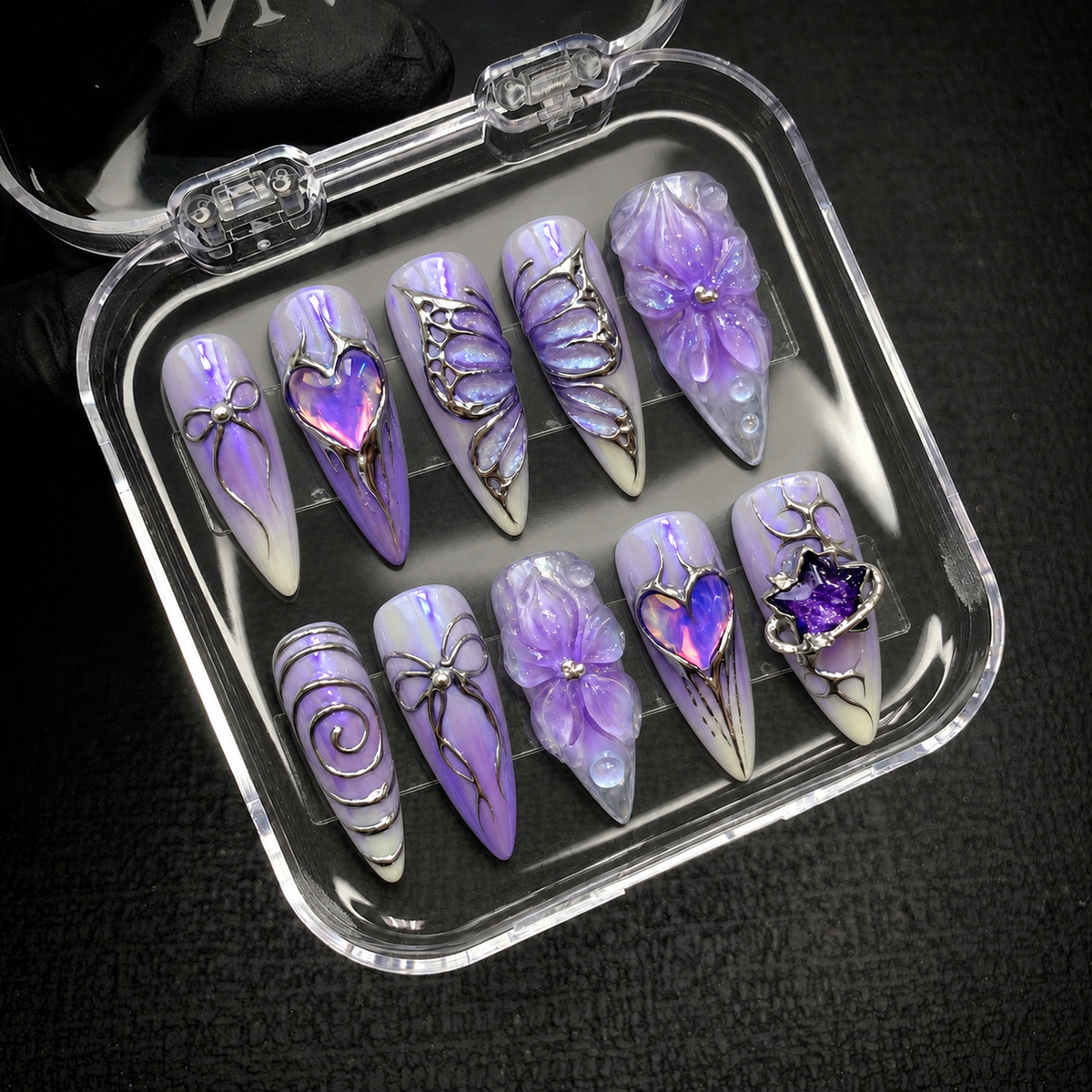 Open Nail Handy package box prepared for the Lavender Orbit press-on nail set.