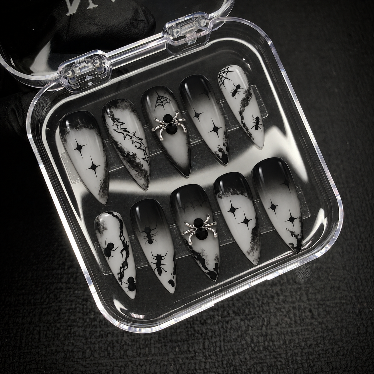 Open Nail Handy package box displaying the Midnight Web press-on nail set and included materials.