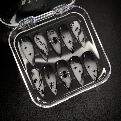 Open Nail Handy package box displaying the Midnight Web press-on nail set and included materials.
