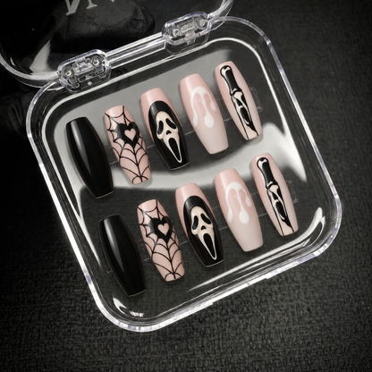 Open Nail Handy package showing the Webbed Noir press-on nail set and included contents