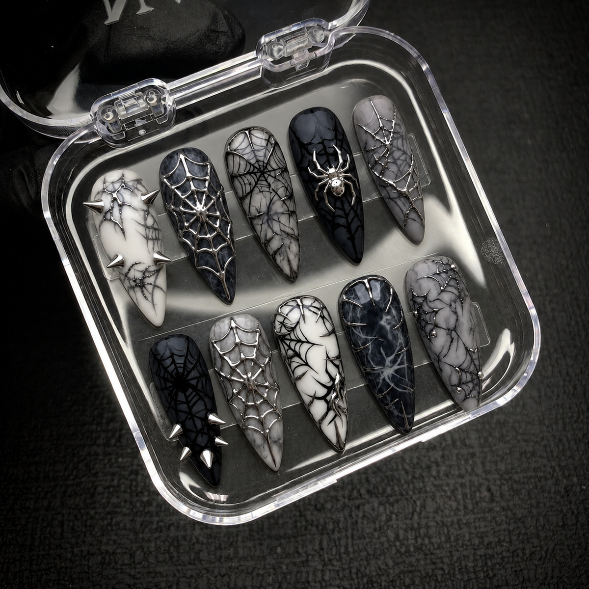 Open Nail Handy package presentation for the Midnight Web Press-On Nails set and included materials.