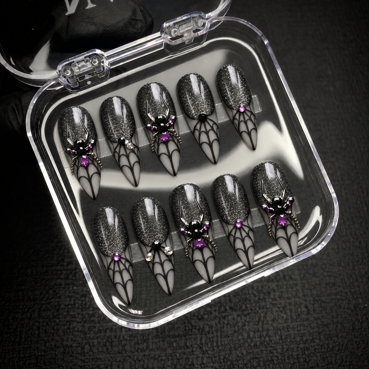 Open Nail Handy package box presenting the Midnight Web press-on nail set.